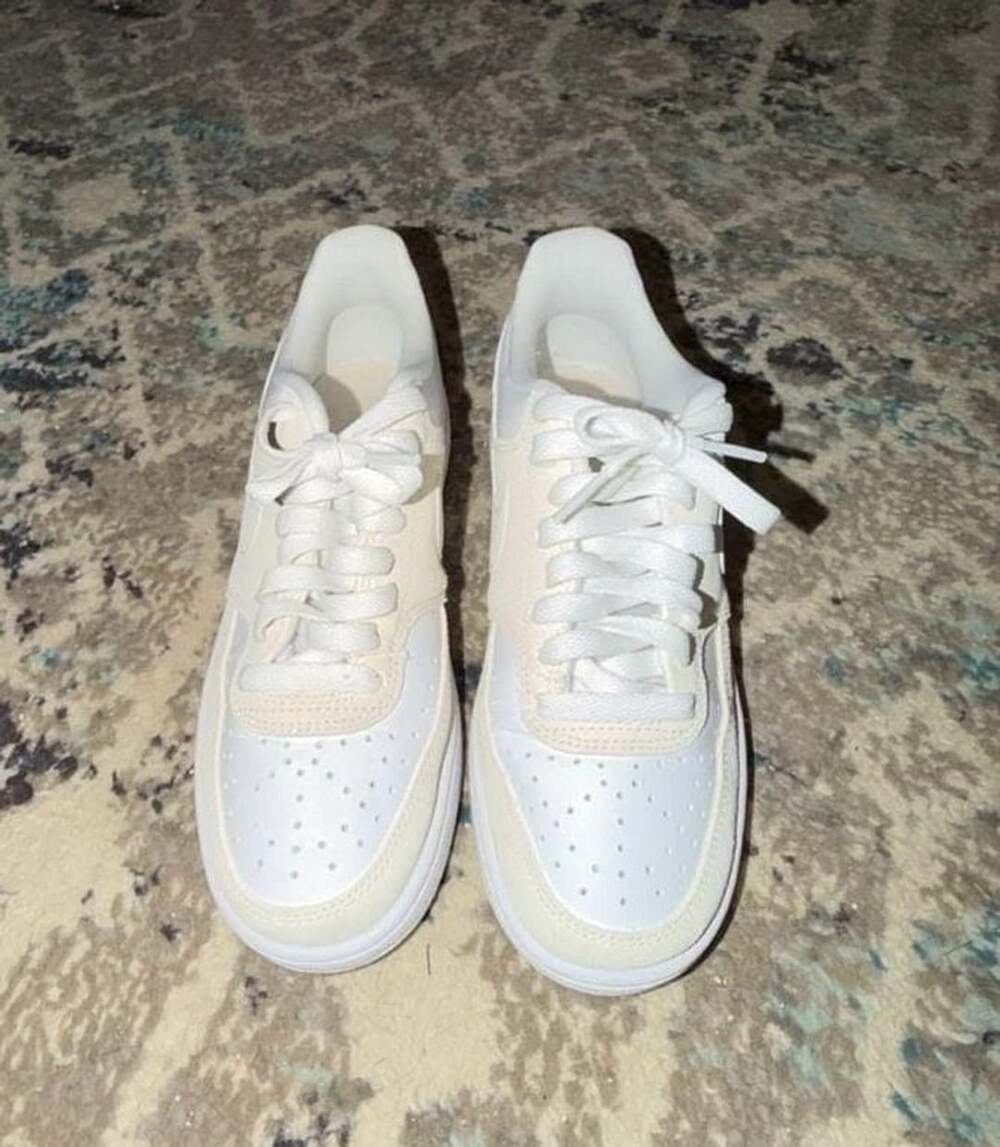 Nike Women's Court Vision Low Sneakers in Pale Ivory/Light Orewood Brown
